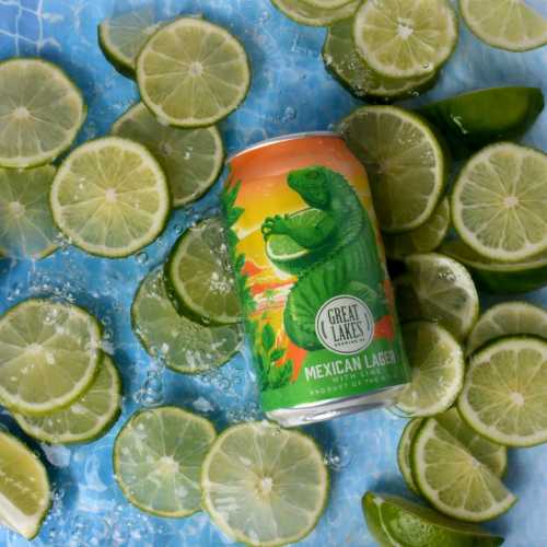 12 oz. Can of Mexican Lager with Lime laid upon a bed of lime wheels.